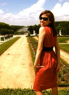 Elegant belt over red dress - back view